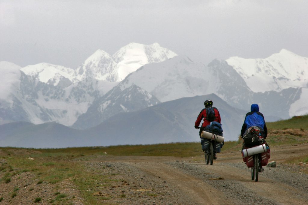 People riding bikes in the mountains